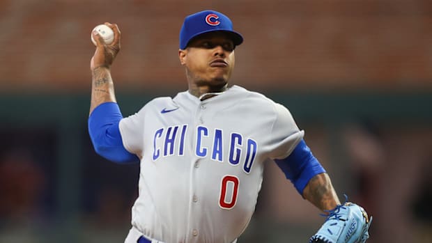 Sep 28, 2023; Atlanta, Georgia, USA; Chicago Cubs starting pitcher Marcus Stroman (0) throws against the Atlanta Braves in the first inning at Truist Park. Mandatory Credit: Brett Davis-USA TODAY Sports  